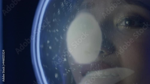 Happy asian girl astronaut wear helmet in outer space, flight cosmos exploration