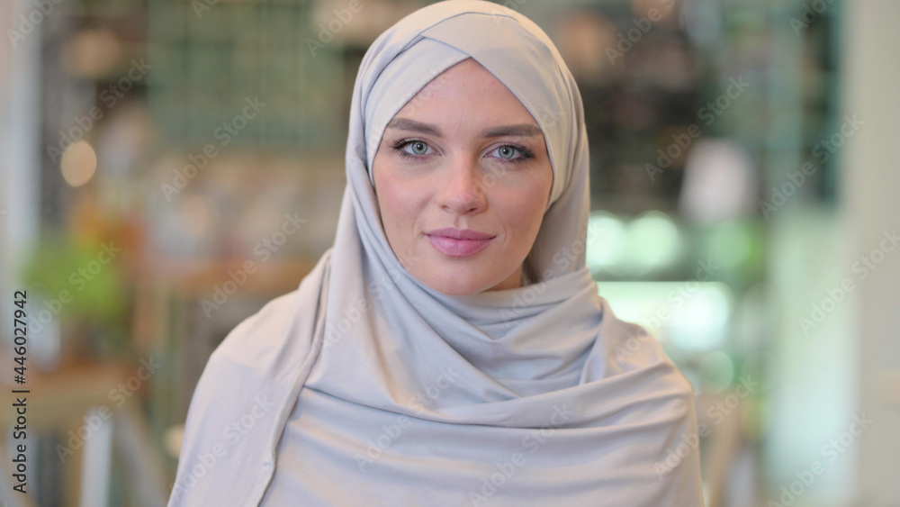 Portrait of Young Arab Woman saying Yes by Shaking Head Portrait of Young Arab Woman saying Yes by Shaking Head