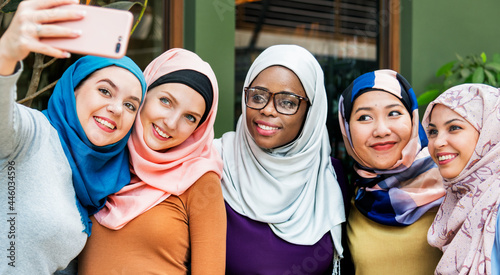 Photography Muslim women taking selfie together