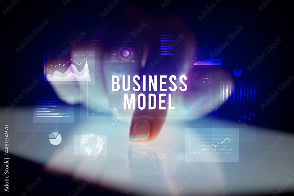 Finger touching tablet with business graphs and icons concept Finger touching tablet with business graphs and icons concept