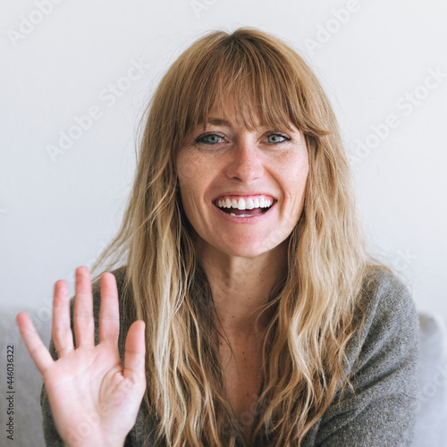 Happy woman at home during coronavirus quarantine