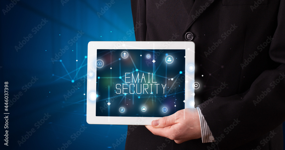 Person holding tablet, security concept Person holding tablet, security concept
