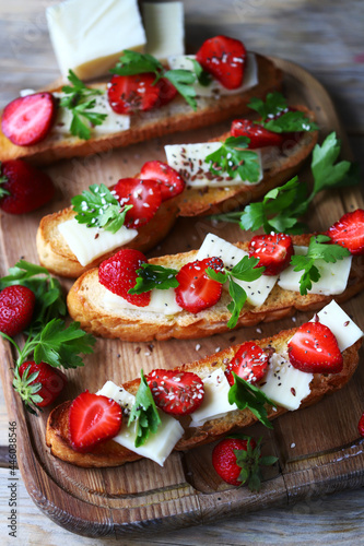 Delicious toast with strawberries and white cheese. Keto toast with strawberries.