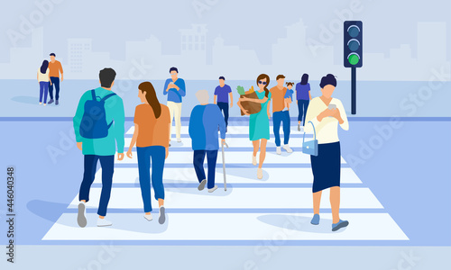 Crowd crosswalk. Crowd of people at the crosswalk. Women and men rush to cross the street along a pedestrian crossing against the backdrop of a cityscape with buildings and traffic lights.