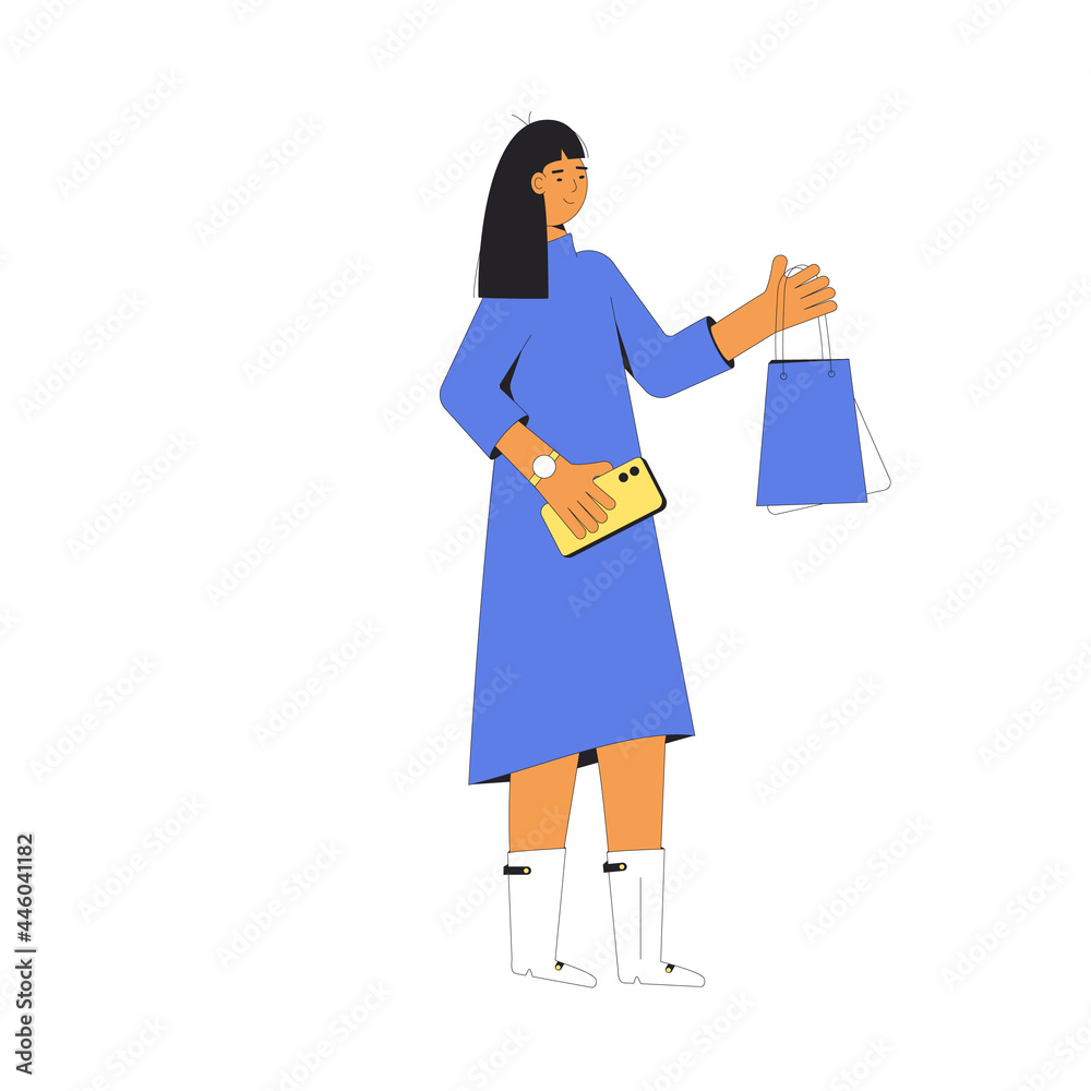 Young woman with shopping bags. Female person standing and holding her purchases.
