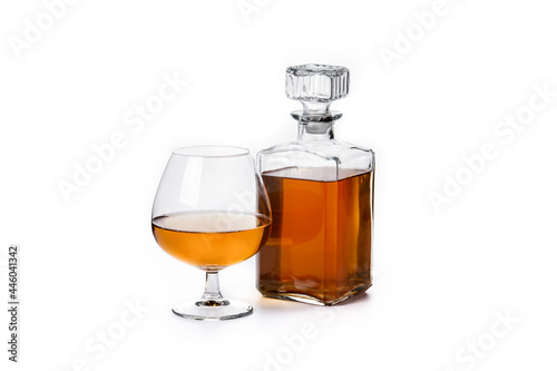 Cognac or whiskey drink isolated on white background