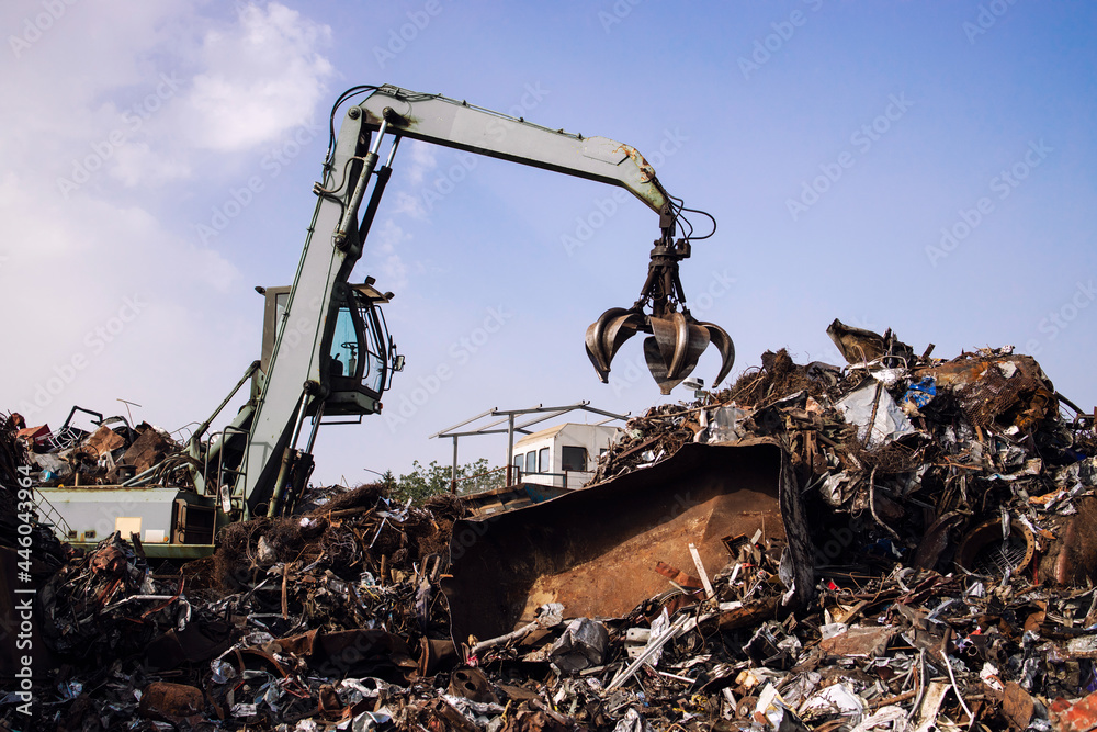 Industrial scrap metal recycling in junkyard. - obrazy, fototapety, plakaty 