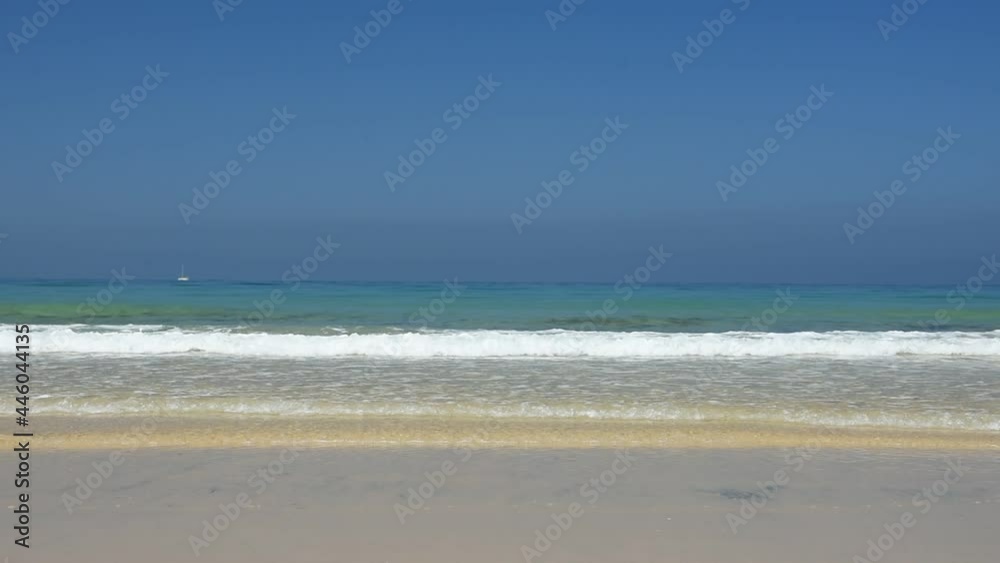 Beautiful spanish beach with blue sky background. Summer vacation and nature environment concept. Beautiful spanish beach with blue sky background. Summer vacation and nature environment concept.