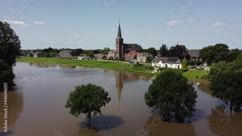 Flooded land and floodplains, drowned trees, river Maas and village Appeltern in the Netherlands, Aerial photo