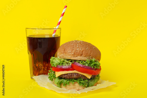 Concept of tasty food with delicious burger