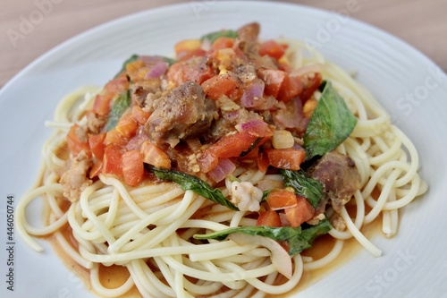 Closeup Spaghetti with Pork, Tomato and Sweet Basil