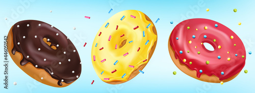 Falling glazed sweet donuts on blue background. Realistic Colorful donuts with pink, chocolate, yellow icing with sprinkle. Vector illustration.