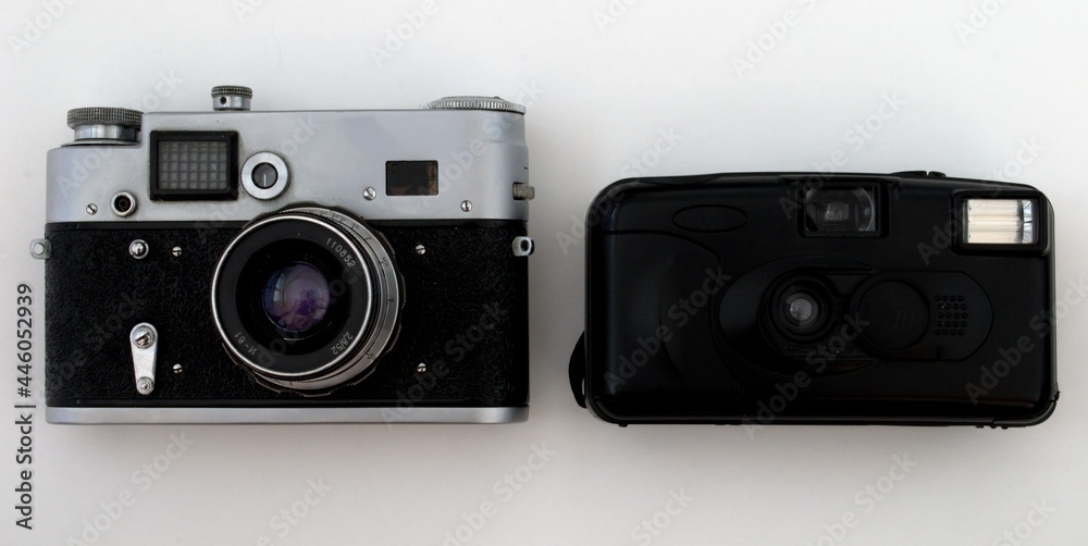 Manual old film and automatic film camera. Retro photo equipment Manual old film and automatic film camera. Retro photo equipment