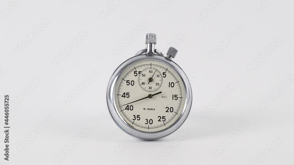 Analogue metal stopwatch on the white background. Classic metallic chrome mechanical analog stopwatch isolated on white background. Vintage stopwatch isolated on a white background. Analogue metal stopwatch on the white background. Classic metallic chrome mechanical analog stopwatch isolated on white background. Vintage stopwatch isolated on a white background.