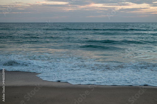 Sea sand sky concept  sunset colors clouds  horizon  horizontal background banner. Inspirational nature landscape  beautiful colors  wonderful scenery of tropical beach. Beach sunset  summer vacation