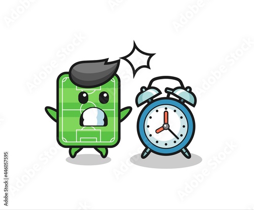 Cartoon Illustration of football field is surprised with a giant alarm clock