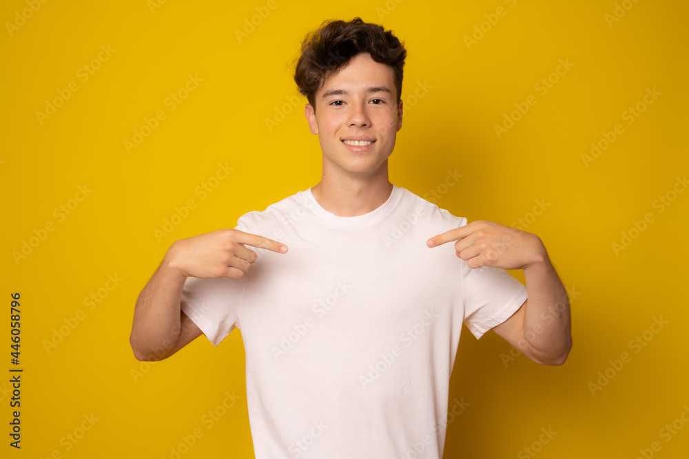 Young caucasian man wearing casual clothes looking confident with smile on face, pointing oneself with fingers proud and happy. Young caucasian man wearing casual clothes looking confident with smile on face, pointing oneself with fingers proud and happy.