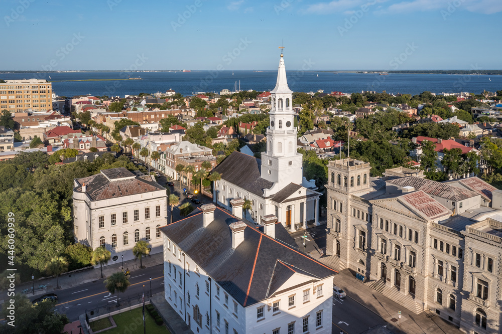 Obraz premium Aerial view of Broad street Charleston, South Carolina port city, cobblestone pastel houses, elegant French Quarter Saint Michael's church historic landmark