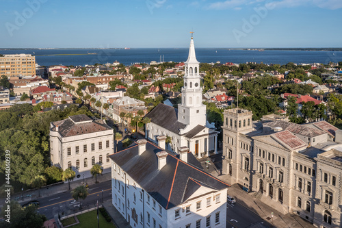 Aerial view of Broad street Charleston, South Carolina port city, cobblestone pastel houses, elegant French Quarter Saint Michael's church historic landmark
