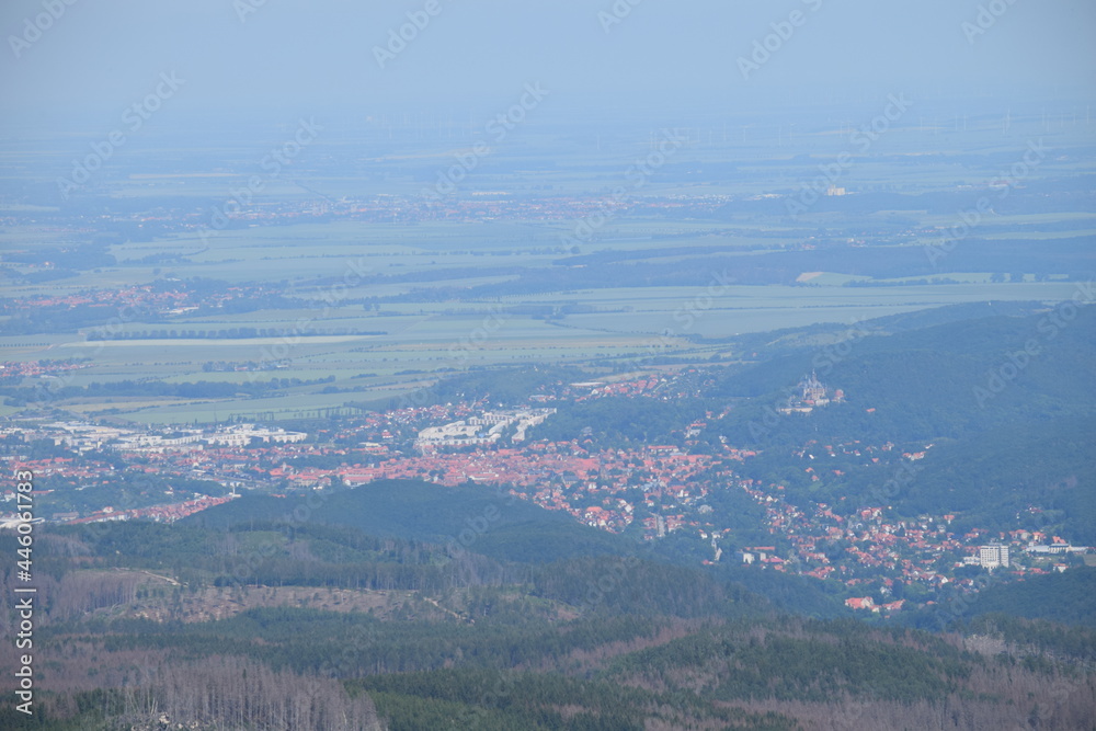 Obraz premium View from the Brocken mountain peak to the city of Wernigerode and the surrounding area; Germany; Harz mountians 
