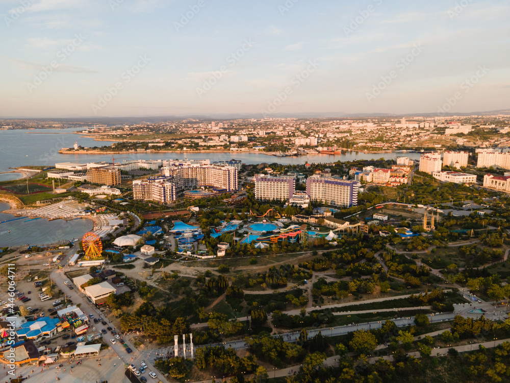 Panorama of the city at sunset. Bird's-eye view of the evening city beach. Black Sea.