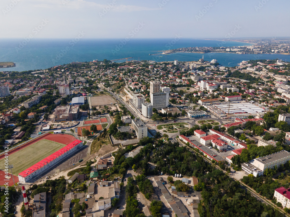 Obraz premium Panorama of the evening city. Bird's eye view of the bay. city ​​port on the Black Sea.