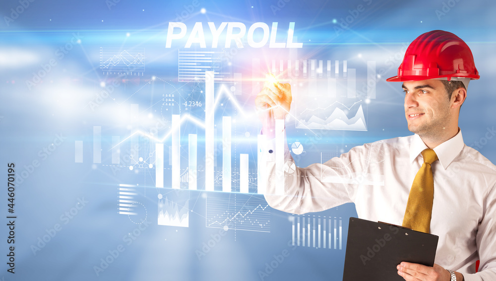 Young businessman with helmet drawing on virutal screen Young businessman with helmet drawing on virutal screen