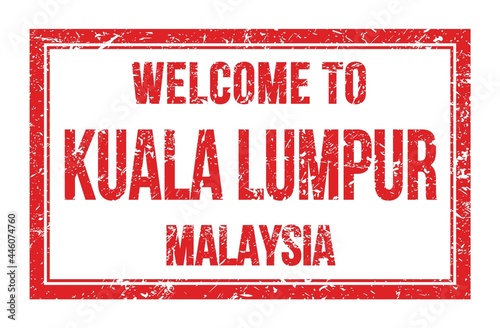 Photography WELCOME TO KUALA LUMPUR - MALAYSIA, words written on red rectangle stamp