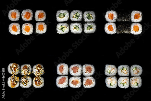 japanese roll set. a set of rolls and sushi on a black background