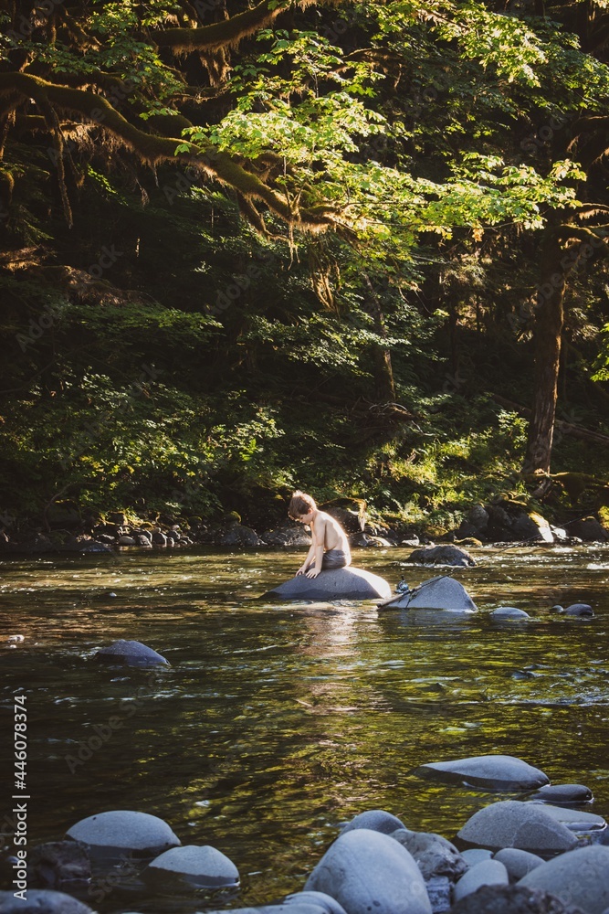 A little boy in the river A little boy in the river