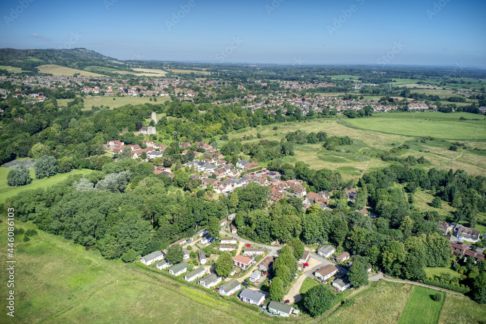 Bramber village aerial with Bramber Castle and St Nicholas Church in the countryside of West Sussex.