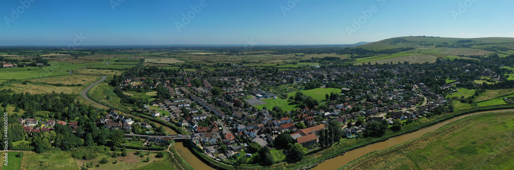 Aerial panoramic photo over Bramber village and the countryside of West Sussex and the South Downs.
