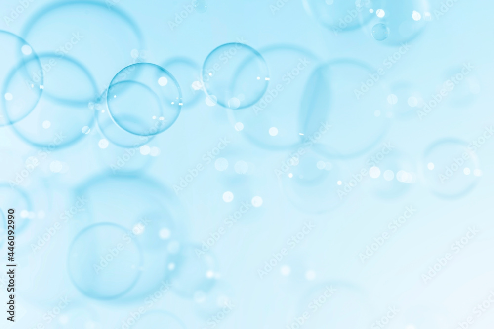 Blue Beautiful Transparent Soap bubbles Floating as Background.