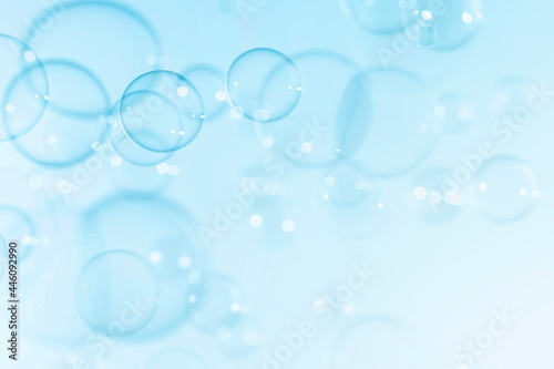 Blue Beautiful Transparent Soap bubbles Floating as Background.