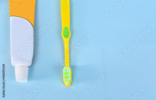 Tooth brush and toothpaste isolated on color background  concept of healthy life and dentist