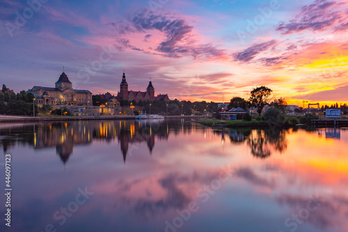Panorama of National Museum and Voivodeship Office with reflection in river Oder at sunset, Szczecin, Poland