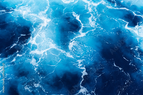 Canvas Print Waves and blue water as a background