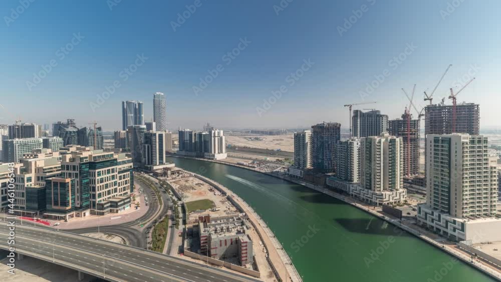 Skyscrapers at the Business Bay aerial all day timelapse in Dubai, United Arab Emirates Skyscrapers at the Business Bay aerial all day timelapse in Dubai, United Arab Emirates