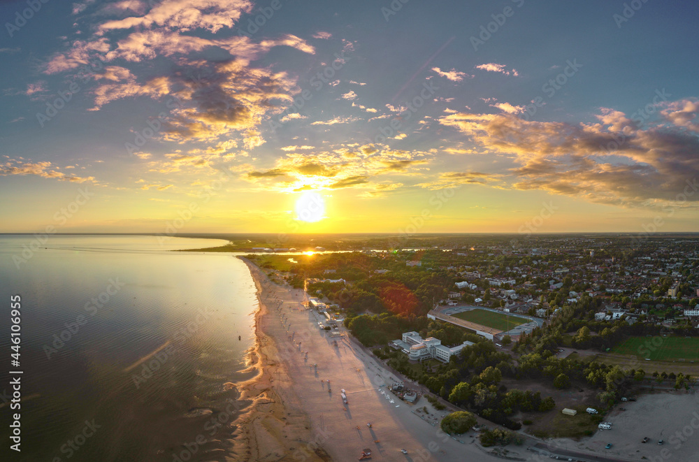 Parnu beach in Estonia during sunny summer sunset, aerial view Parnu beach in Estonia during sunny summer sunset, aerial view