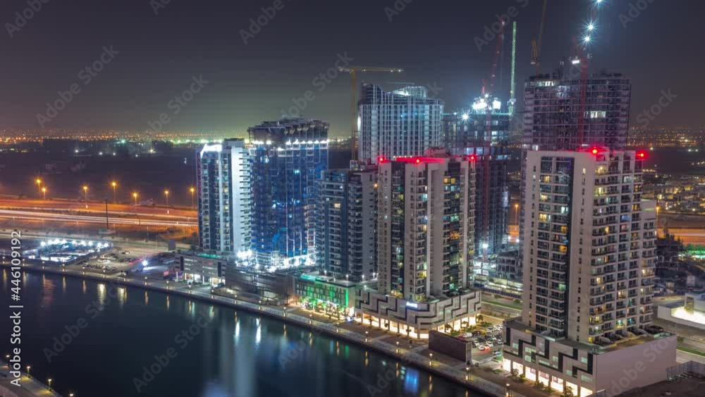 Towers at the Business Bay aerial all night timelapse in Dubai, United Arab Emirates Towers at the Business Bay aerial all night timelapse in Dubai, United Arab Emirates
