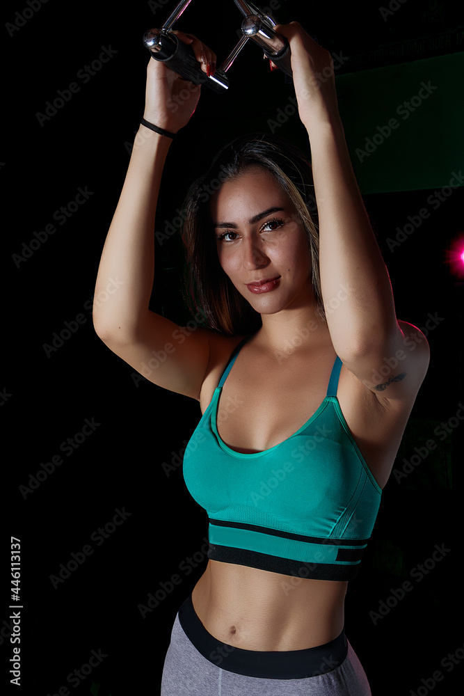 latina woman at the bodybuilding gym