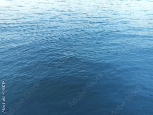 Water background. Clear rippled water in ocean wallpaper. Banner, icon wallpaper. Desktop background. Web design. Clear water in pool. Summer activity. Swimming, sunbathing