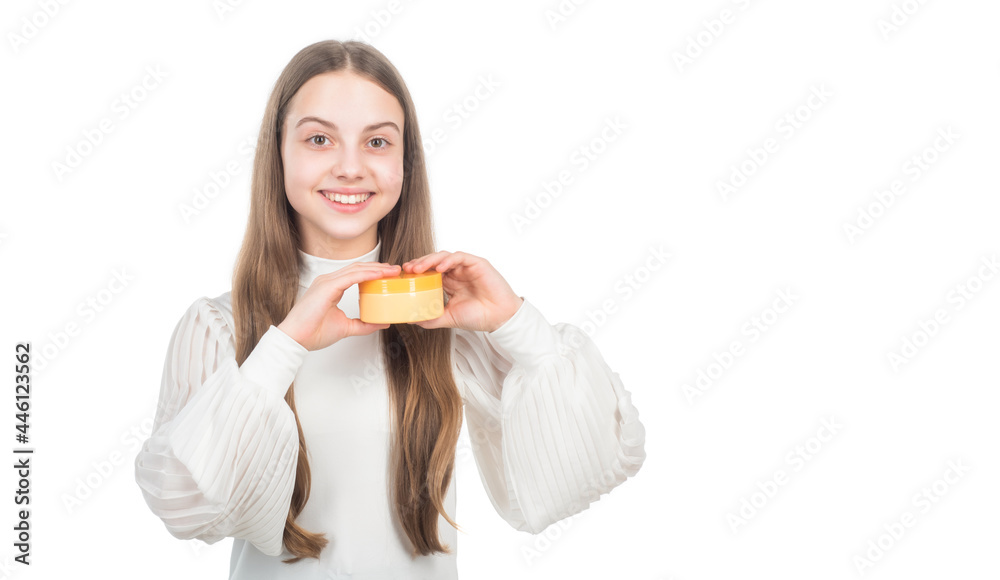 presenting cosmetic product for teen. kid use face cream. happy girl hold hair mask. presenting cosmetic product for teen. kid use face cream. happy girl hold hair mask.