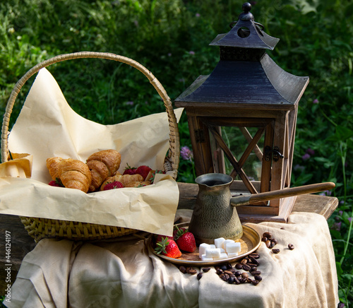 morning breakfast.Croissant,strawberries,and coffee.