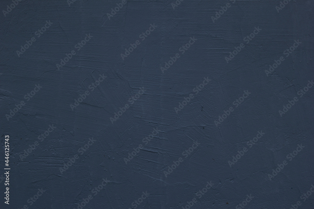 Gray plastered wall. Gray background. The texture of an old painted wall. Gray plastered wall. Gray background. The texture of an old painted wall.