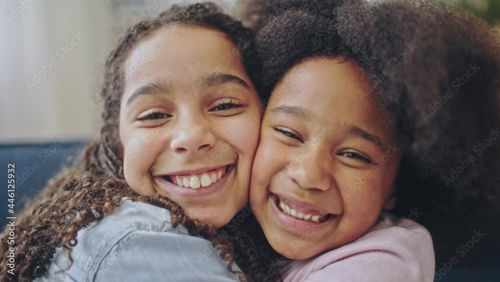 Loving black sisters hugging and smiling sincerely, family support and care