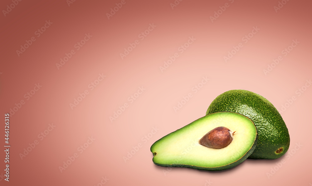 Composition of ripe avocados on a bright background.