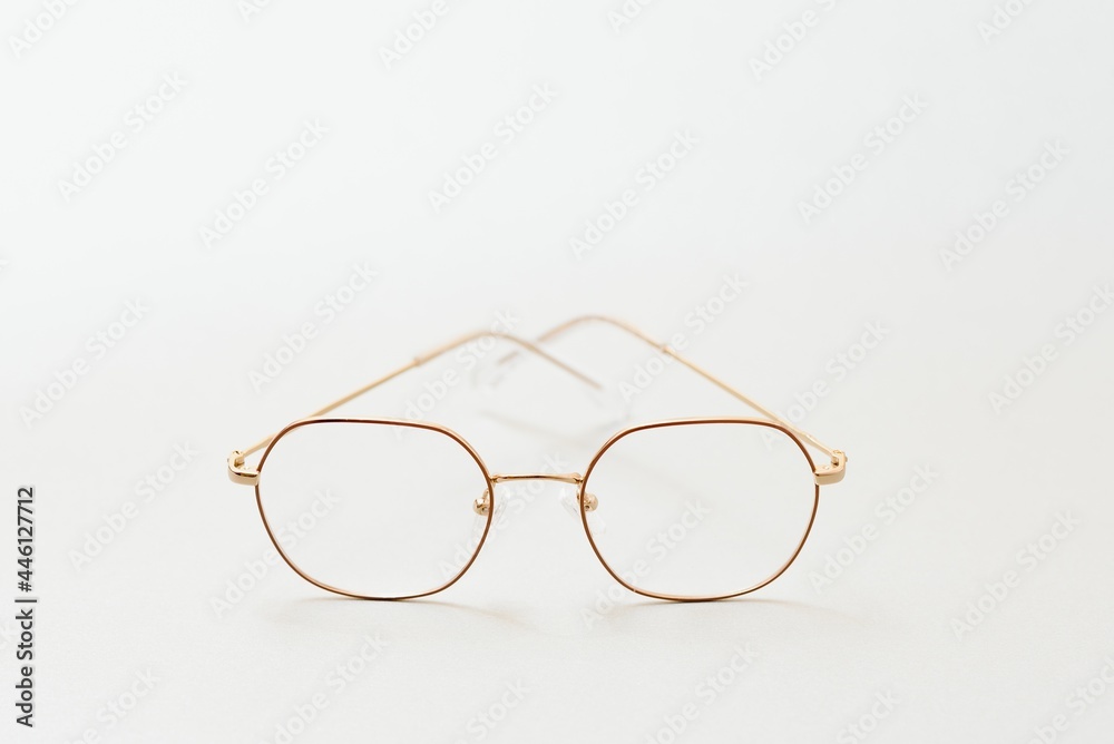 isolation glasses on white background. black and white combination oval eyeglass frames. oval eye glasses frame in the photo from above on a white background isolation glasses on white background. black and white combination oval eyeglass frames. oval eye glasses frame in the photo from above on a white background