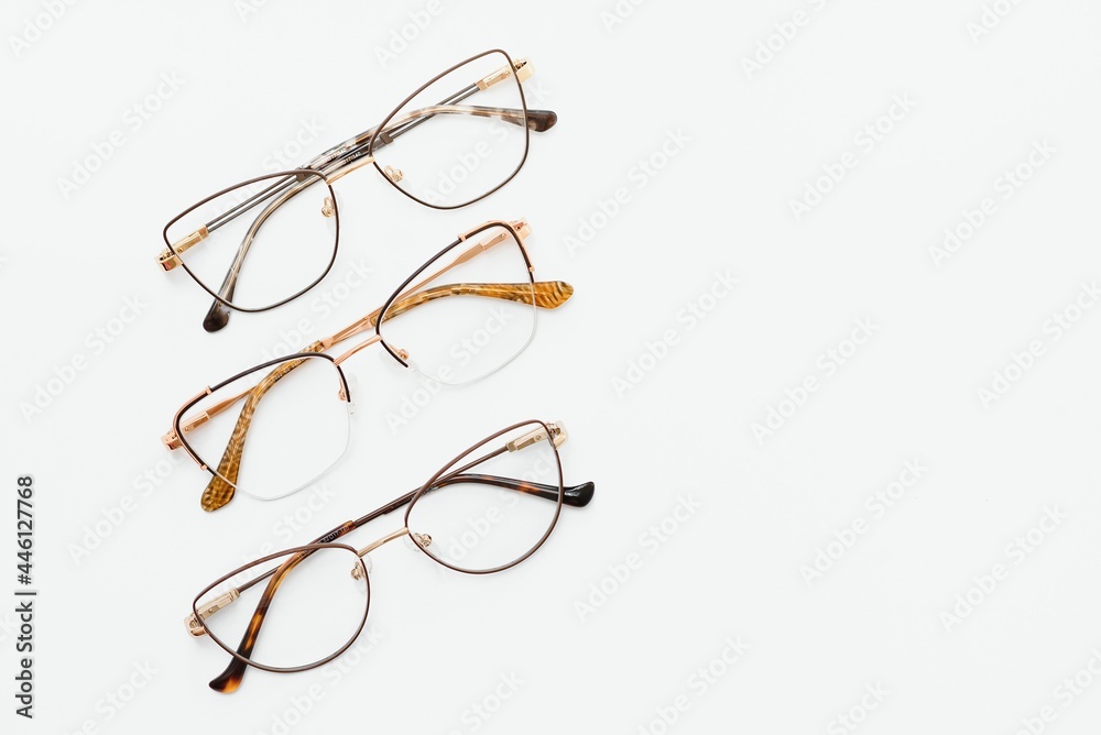 isolation glasses on white background. black and white combination oval eyeglass frames. oval eye glasses frame in the photo from above on a white background isolation glasses on white background. black and white combination oval eyeglass frames. oval eye glasses frame in the photo from above on a white background