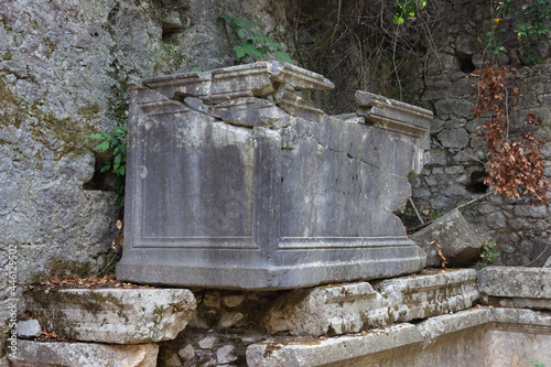 Ancient Lycian stone tomb ruins in the Olympos City archaeological site in Antalya, Turkey.